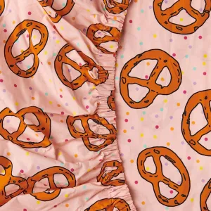 Kip and Co | Pretzels Pink Fitted Cot/Bassinet Sheet